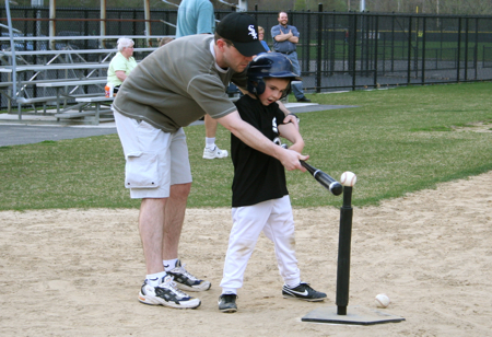 Coach Daddy getting Zan ready to crush the ball